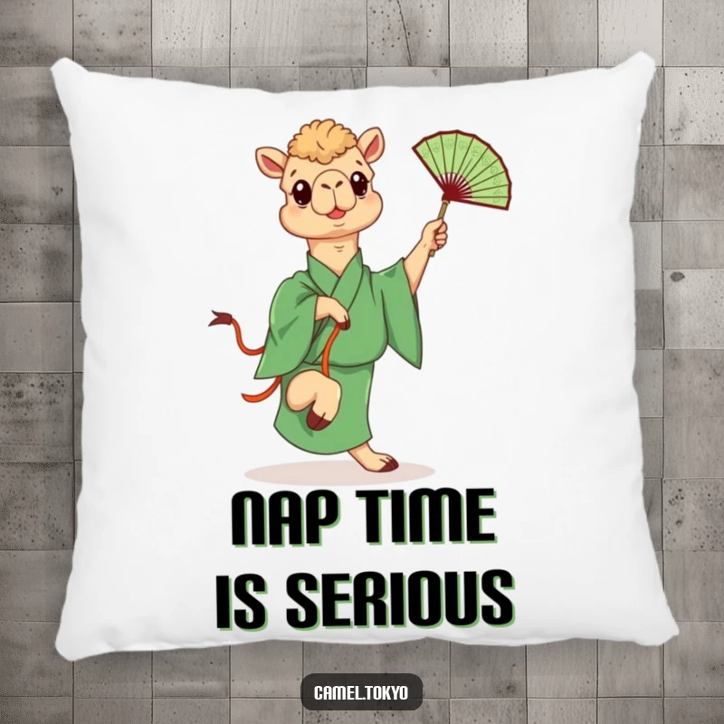 Funny pillow featuring a camel in a green kimono playfully kicking a fan, offering humorous comfort and decor.
